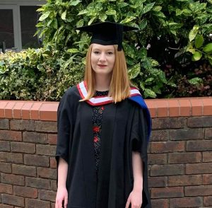 Photo of the author, Emily White, at her undergraduate gradutation